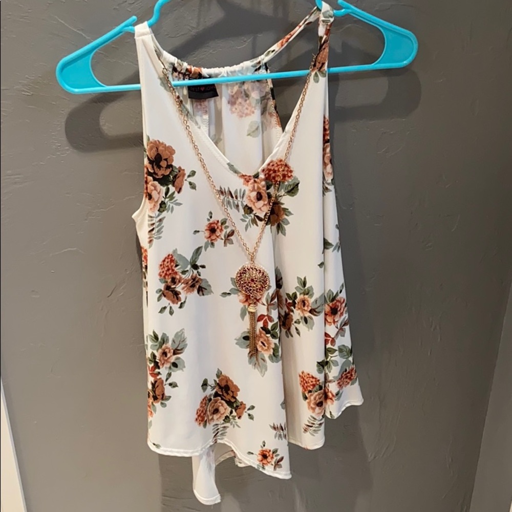 Off white tank top with flower pattern